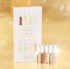 Close-up of Huda KAYALI sampler bottles for easy scent exploration.