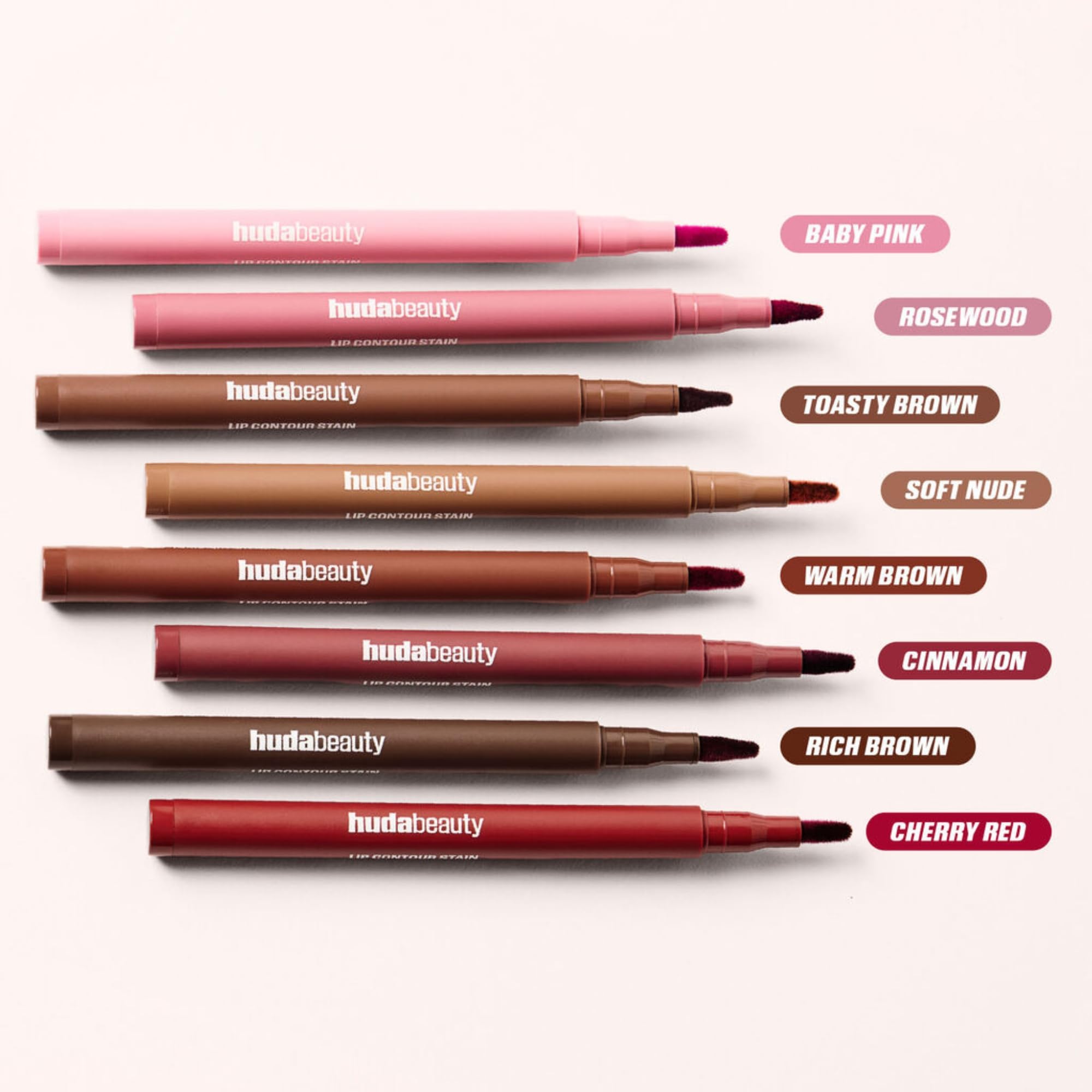 Swatch reveal of rich pigmentation in Huda Lip Contour Stain Warm Brown