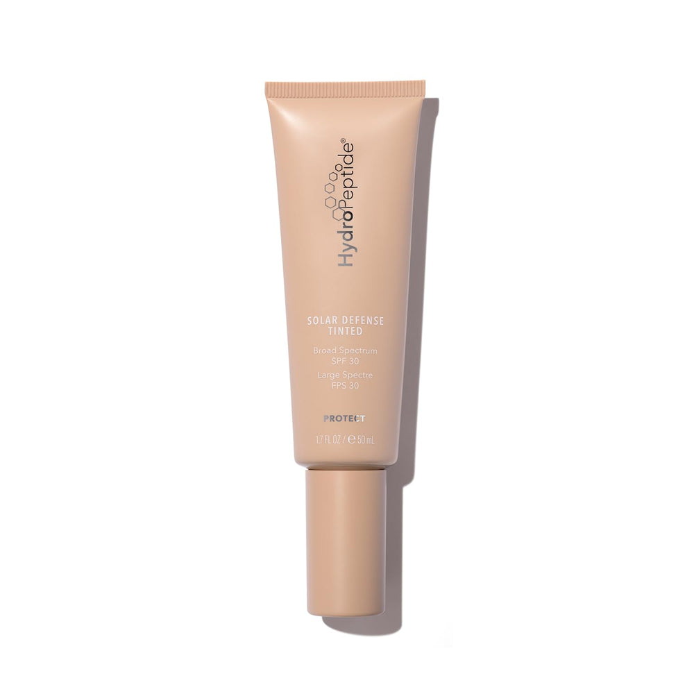 HydroPeptide Solar Defense tinted moisturizer bottle showing SPF 30 protection and radiant finish.