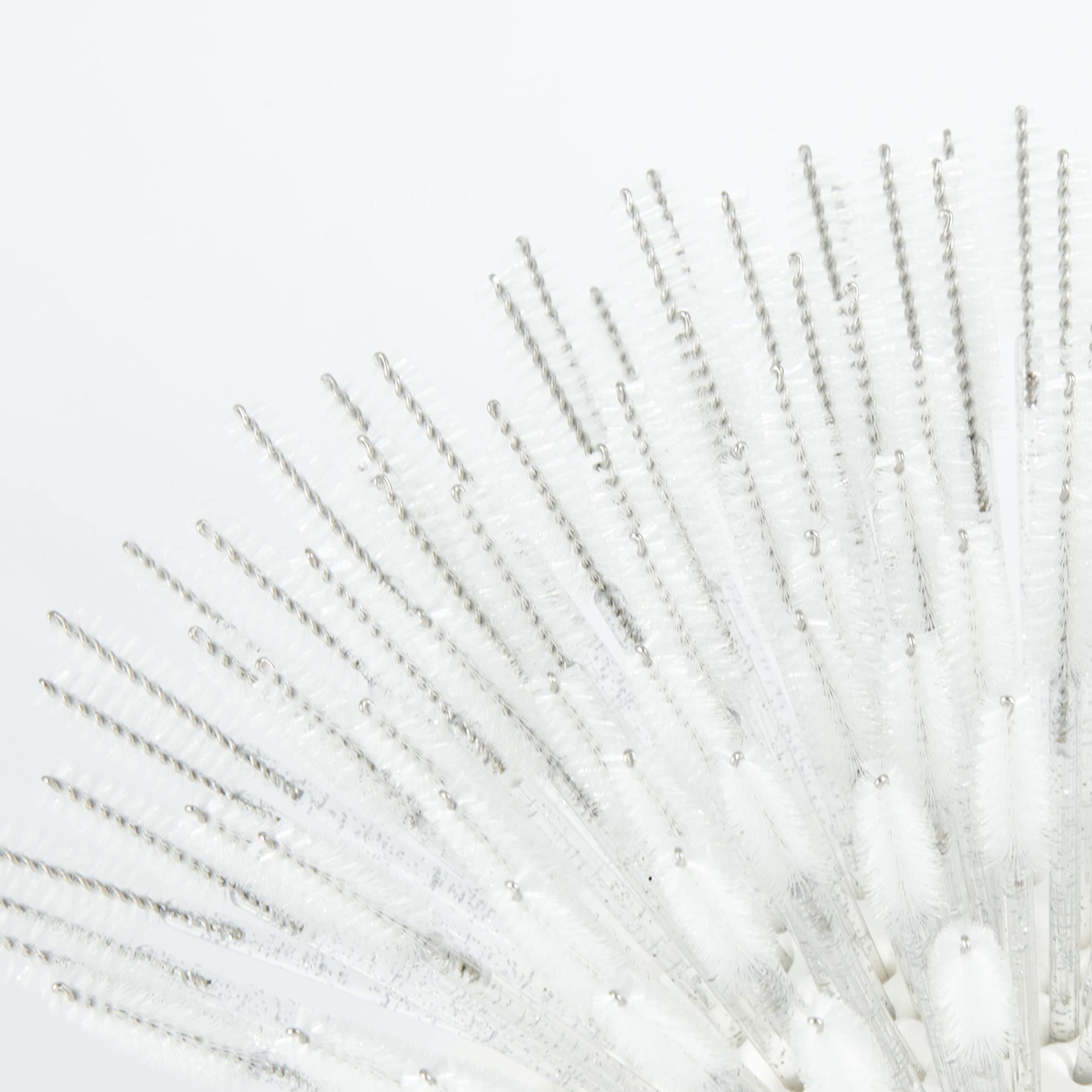 i-Laesh close-up of spiral head brush delivering precise lash grooming.