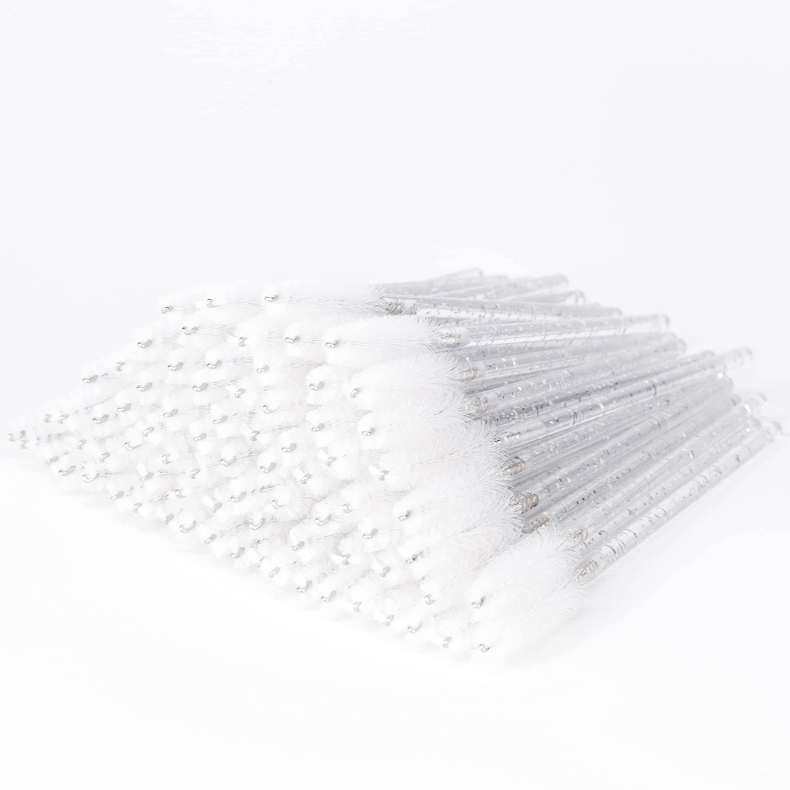 i-Laesh crystal mascara wands with disposable brushes and white crystal handles for quick touch-ups.