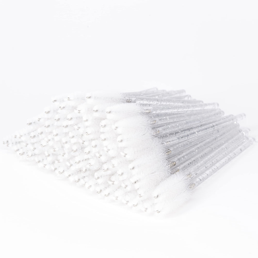 i-Laesh crystal mascara wands with disposable brushes and white crystal handles for quick touch-ups.