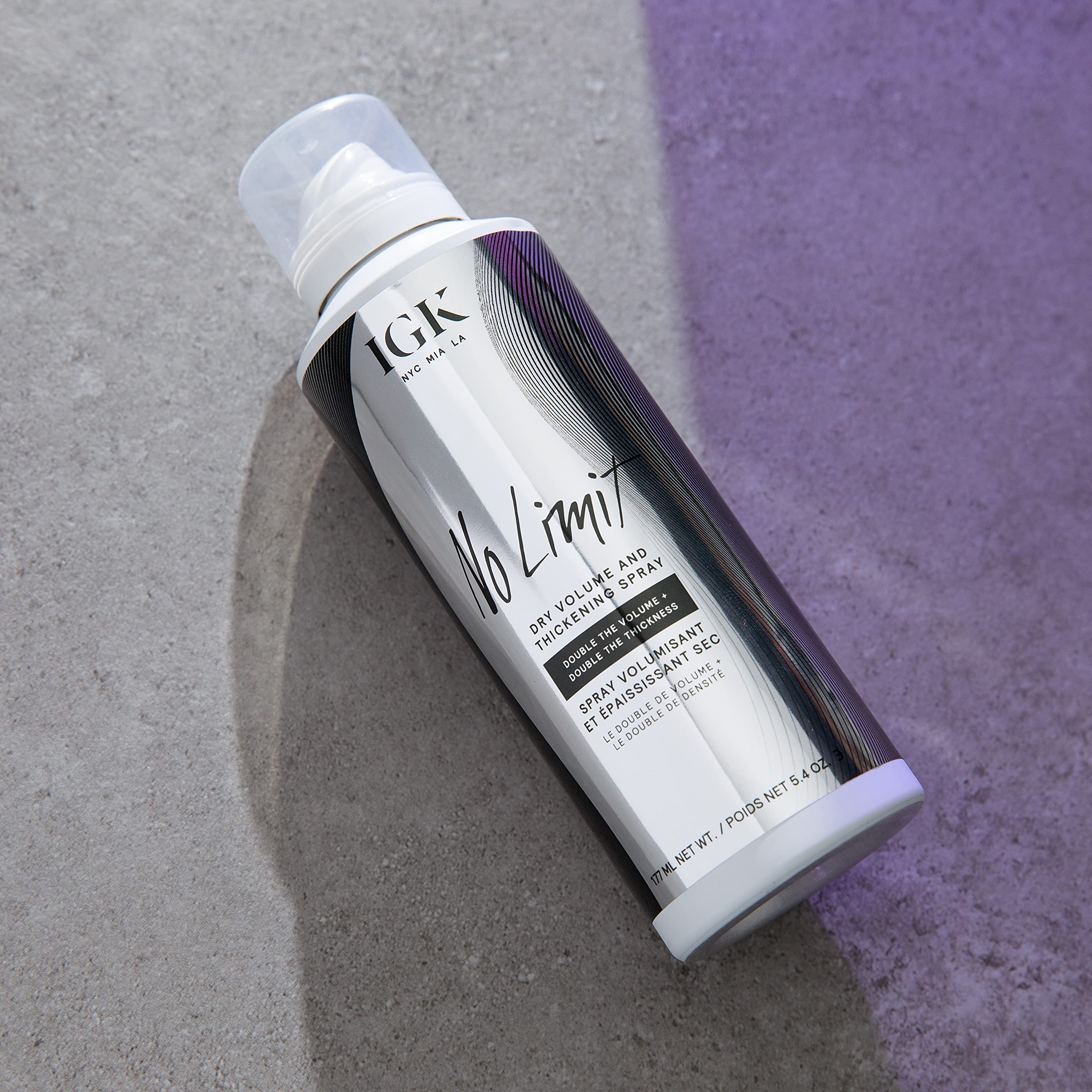 IGK NO LIMIT dispense action showing quick-drying, non-sticky finish.