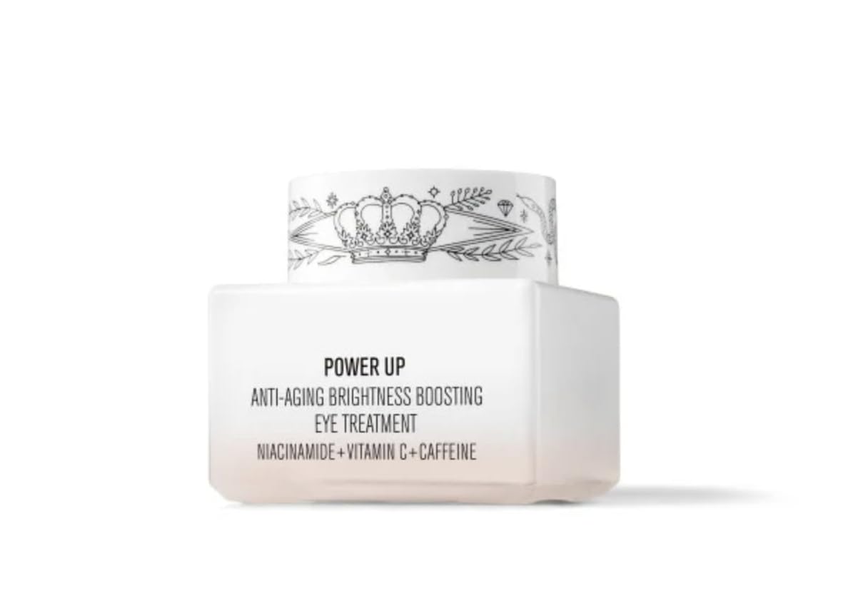 Il Makiage Power Up Eye Cream applicator demonstrating depuffing massage for smoother skin