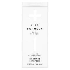 ILES FORMULA shampoo bottle demonstrates hydrating formula for dry hair.