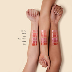 Close-up of ILIA Balmy Gloss Lip Oil with hyaluronic acid for hydration.