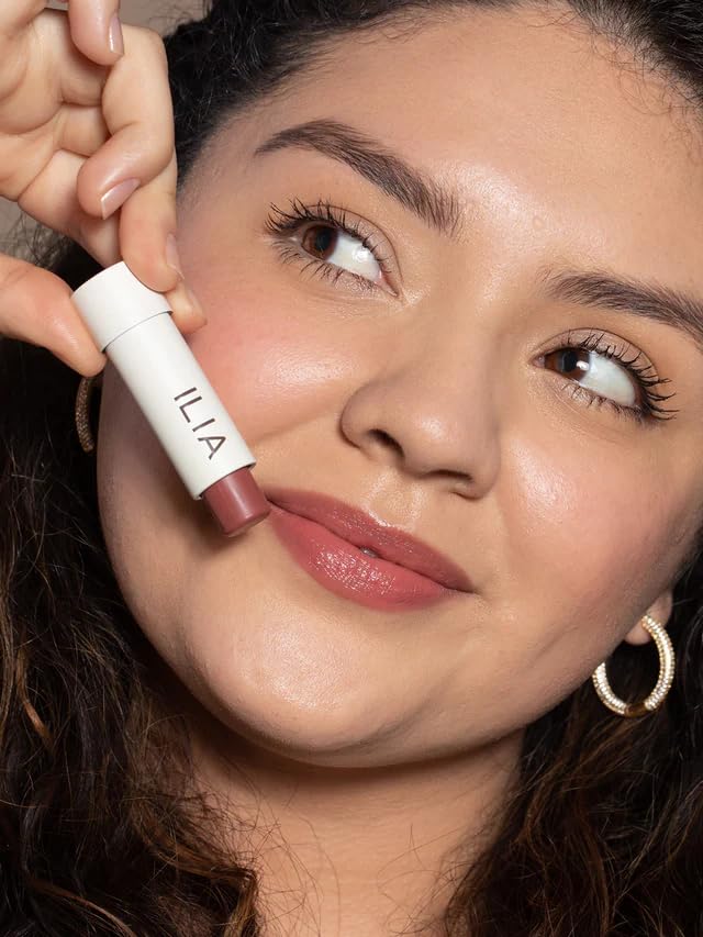 ILIA Balmy Tint Hydrating Lip Balm close-up with shea butter in focus