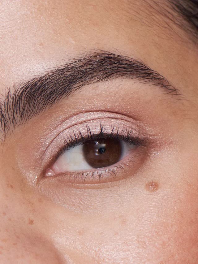 Close-up of Aura product on lid highlighting clean, vegan formula