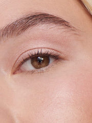 Aura shade on eyelid delivering bold metallic payoff with smooth blend