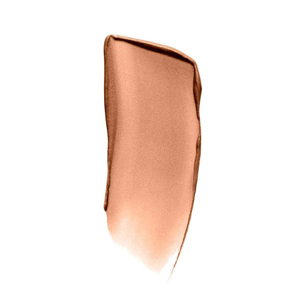 ILIA Sunshift Ray application with angled brush for sculpted cheekbones.