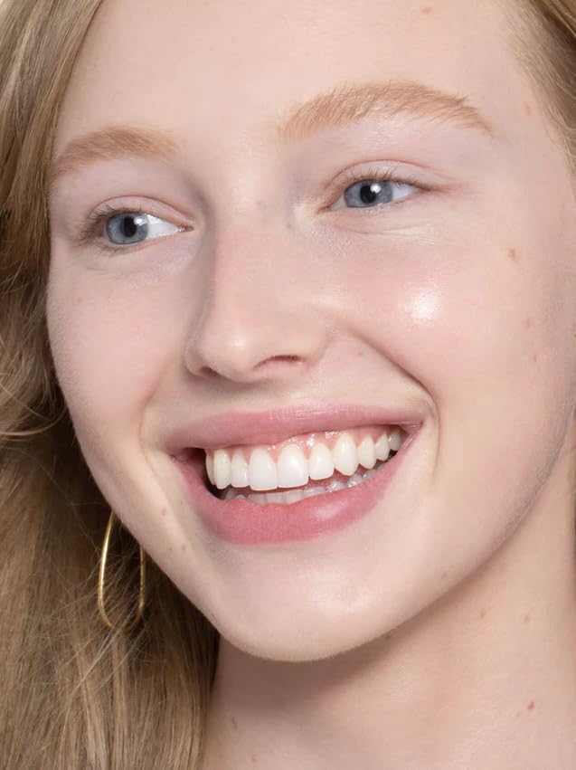 Close-up reveals non-comedogenic, oil-free formula for clear skin.