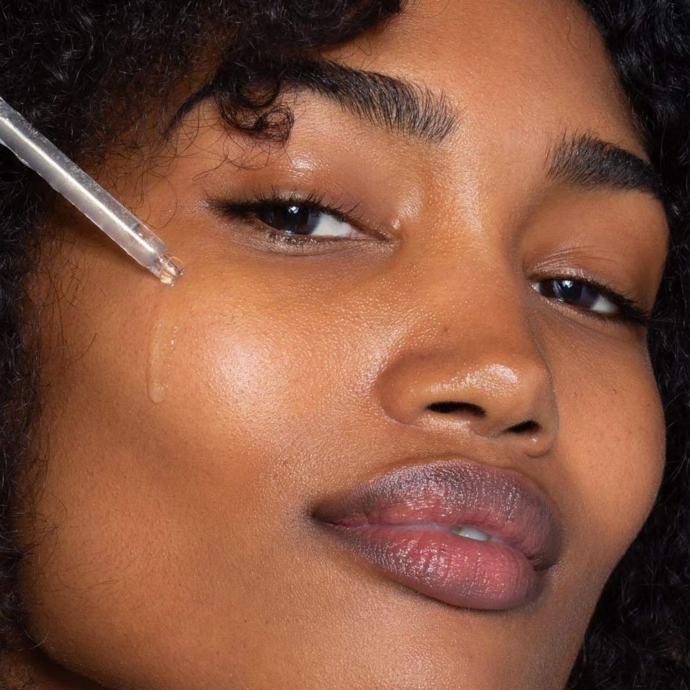 Close-up of ILIA True Skin Priming Serum pump and bottle