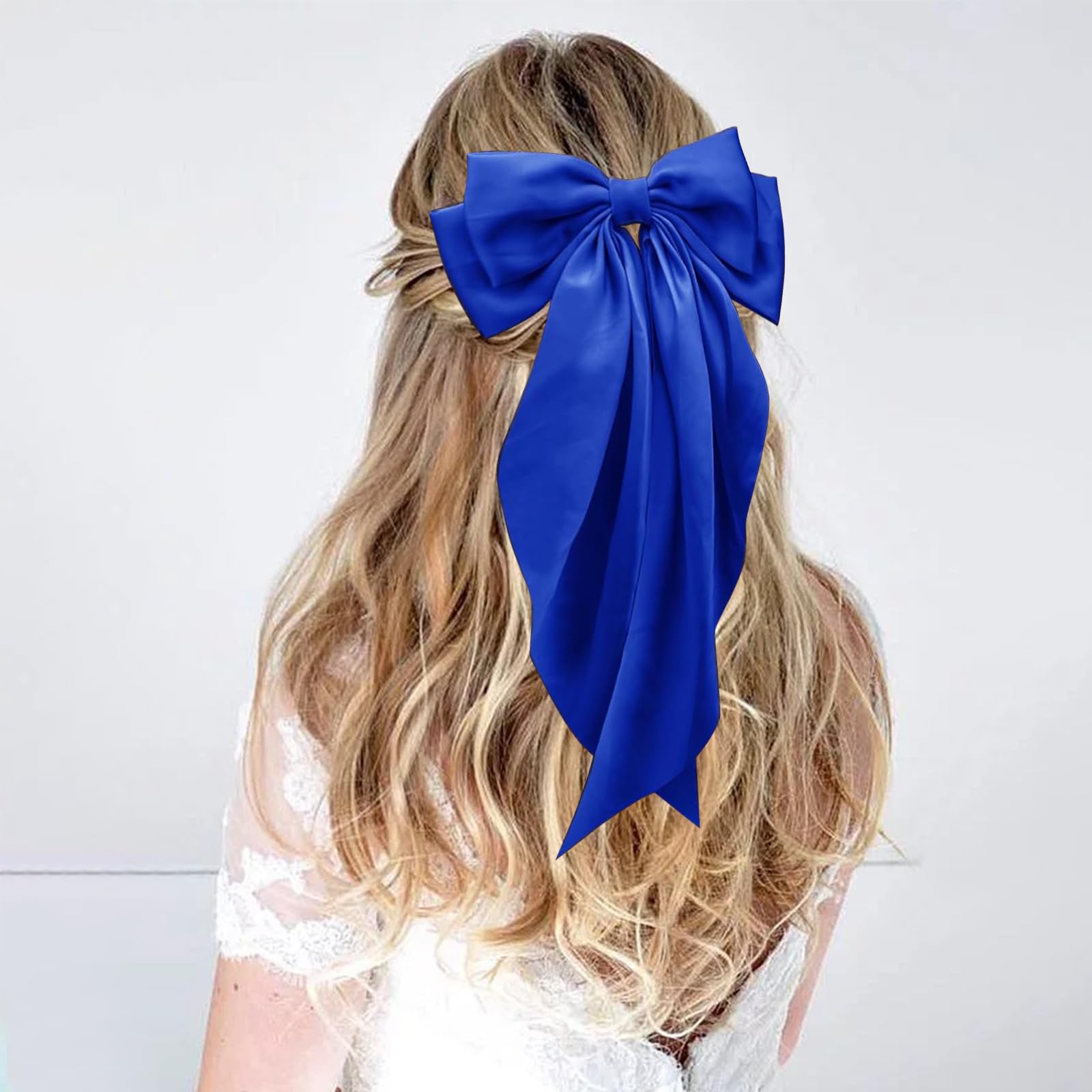 Illpta girls hair accessory bow in royal blue enhances playful everyday looks.