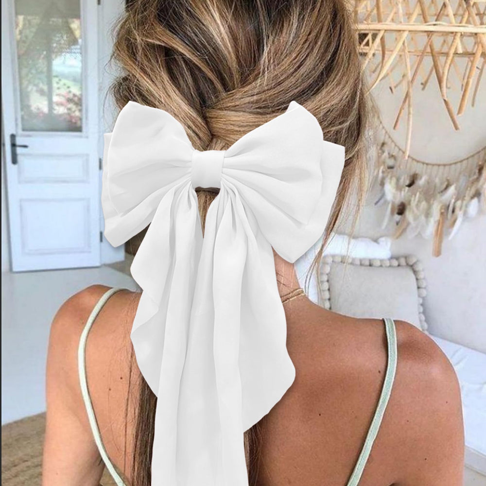 illpta hair bow for girls in white for party looks.