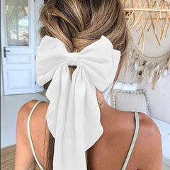 illpta hair bow for girls in white for party looks.