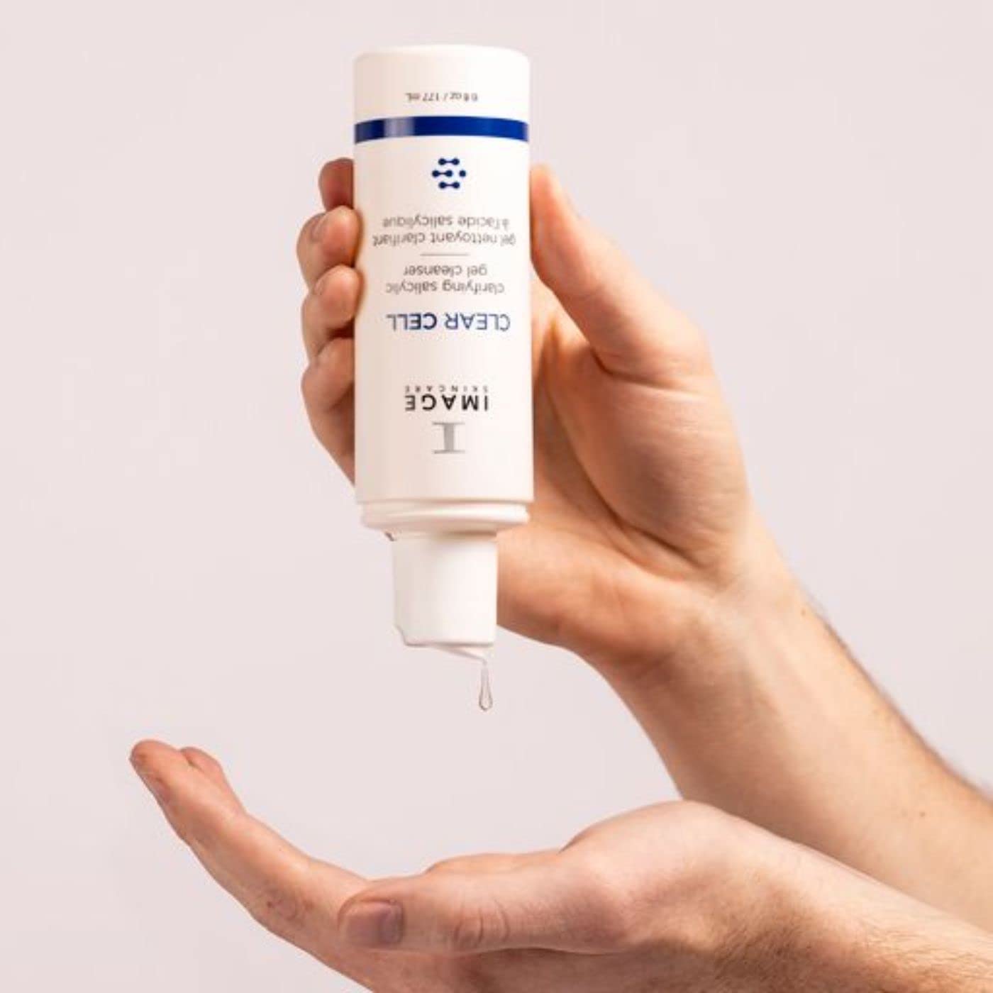 Bottle label features mint, eucalyptus, and tea tree oils for a refreshing cleanse.