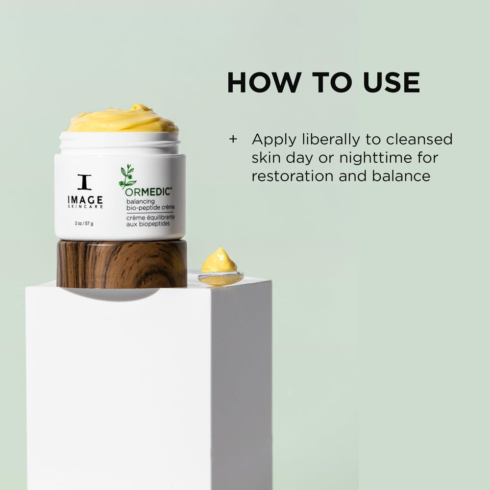 Application on hands with ORMEDIC Biopeptide Creme showing rich cream.