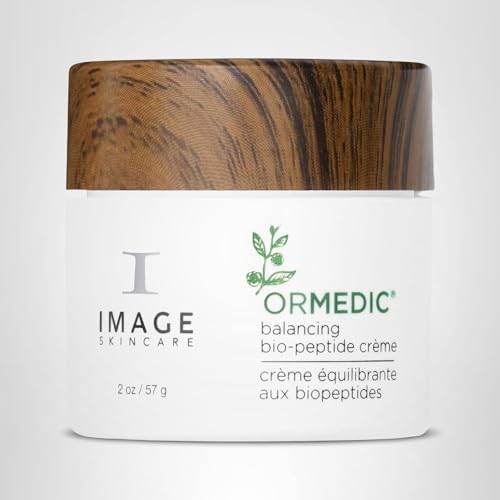Open jar lid with ORMEDIC Biopeptide Creme visible.