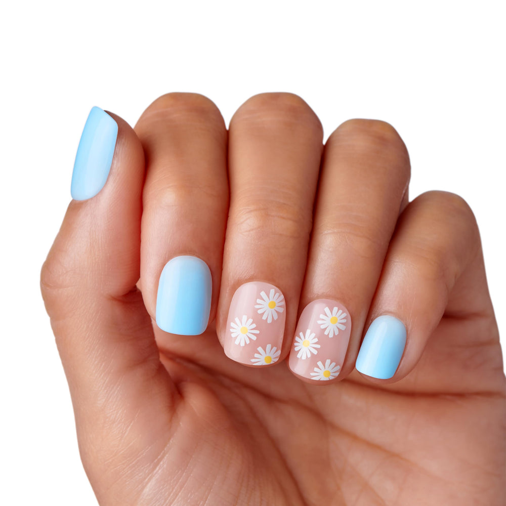 imPRESS Kiss manicure stick helps push back cuticles during prep.
