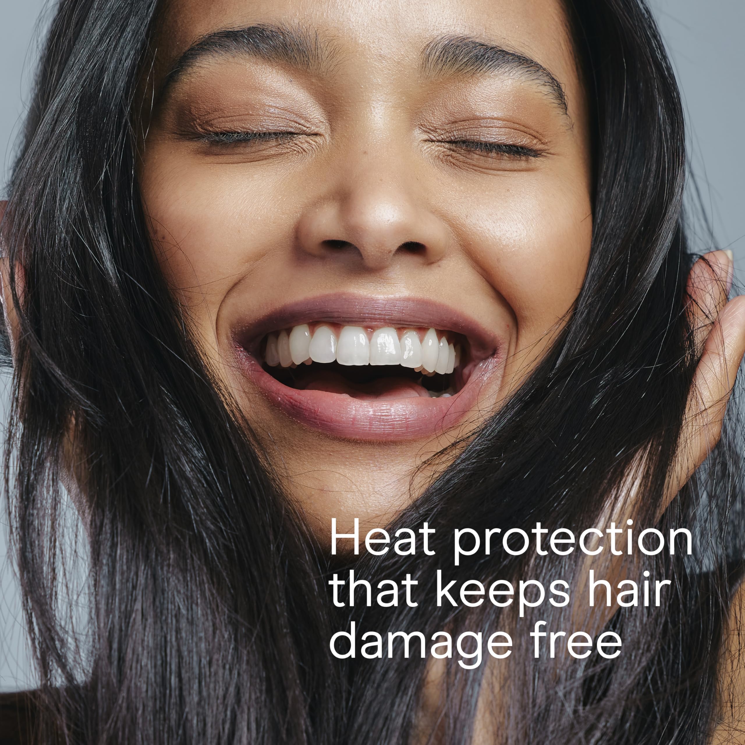 INFINITI PRO BY CONAIR rose gold flat iron straight or wave styling options.