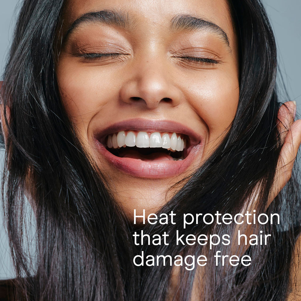 INFINITI PRO BY CONAIR rose gold flat iron straight or wave styling options.