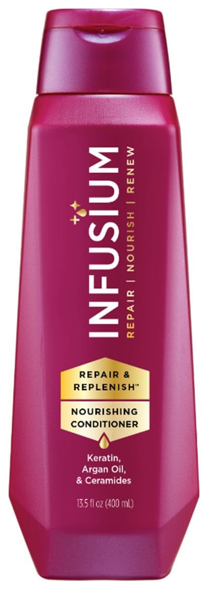 Infusium Repair and Replenish bottle pour showing deep hydration for hair