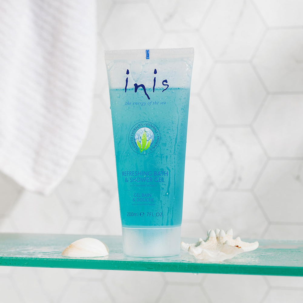 Inis energy of the Sea bottle being dispensed for a refreshing shower.
