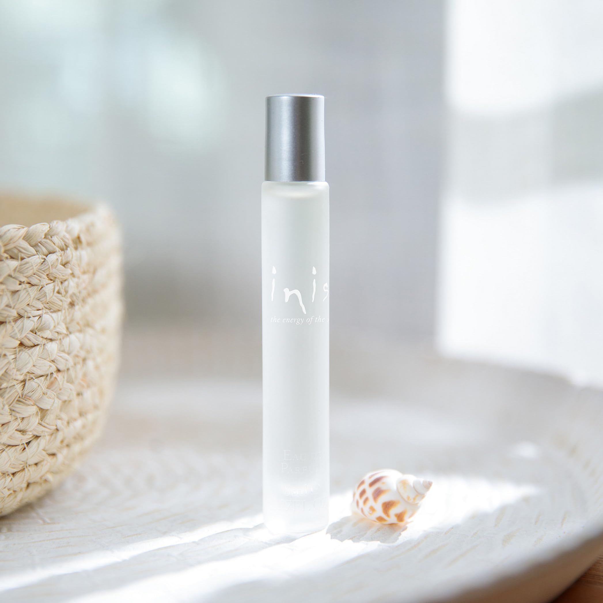 Close-up of the frosted roll-on bottle cap highlighting sea-inspired finish for travel