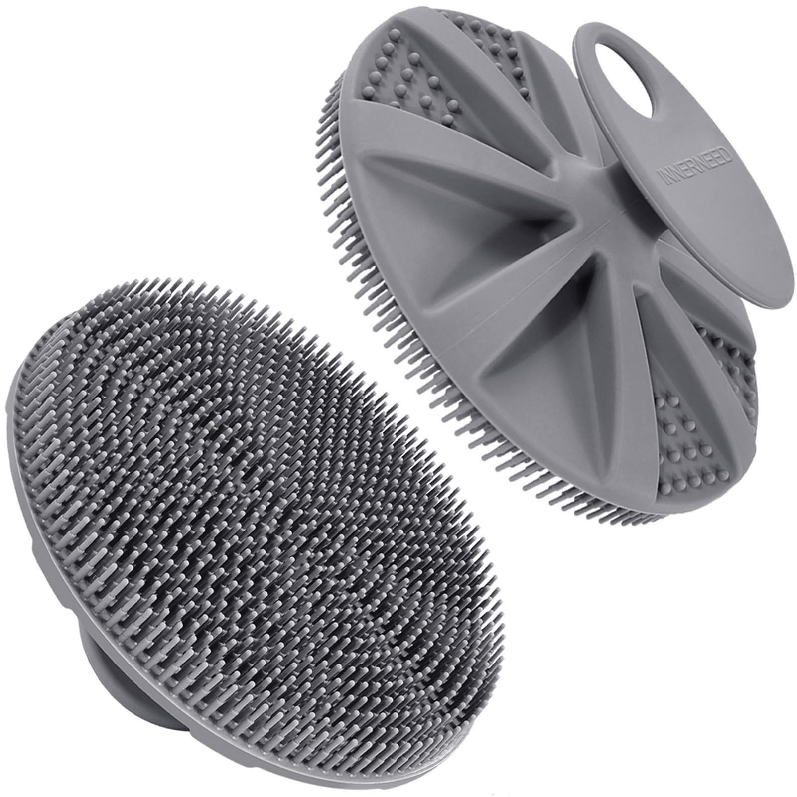 INNERNEED silicone body scrubber with ergonomic handle for easy cleansing.