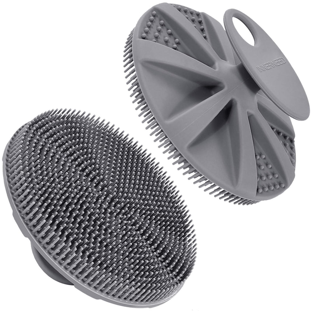 INNERNEED silicone body scrubber with ergonomic handle for easy cleansing.