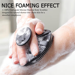 INNERNEED silicone shower brush with ergonomic handle for comfortable scrubbing.