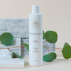 INNERSENSE Clarity Hairbath label highlights hypoallergenic, fragrance-free benefits for irritated skin.