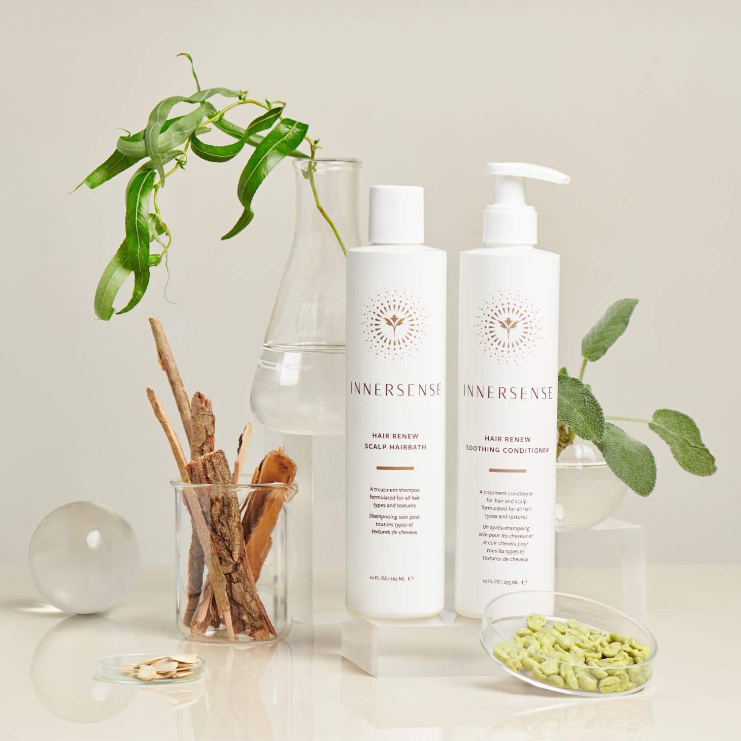 INNERSENSE Hair Renew Soothing Conditioner being massaged through hair to reduce frizz and boost shine.
