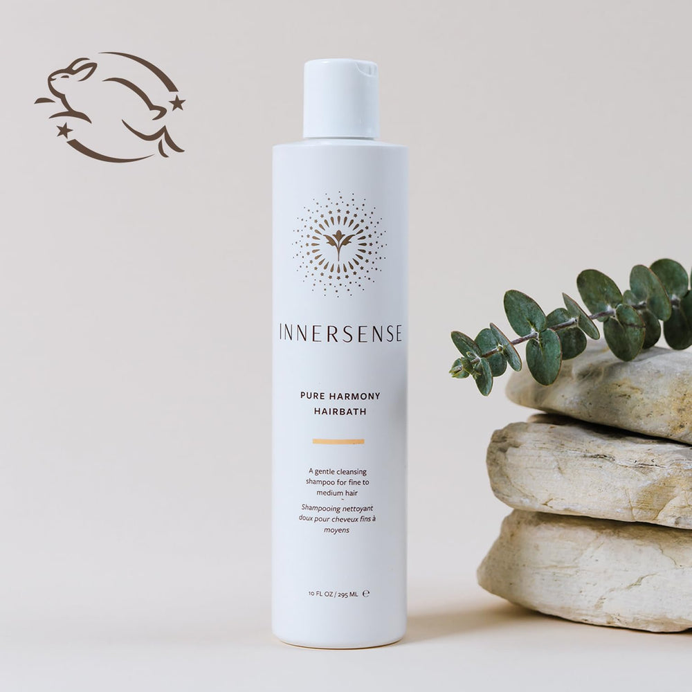 INNERSENSE creamy lather in motion illustrating lightweight, volumizing cleanse.
