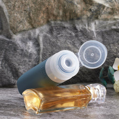 Four containers including 3oz and 2oz bottles for cosmetics on the go