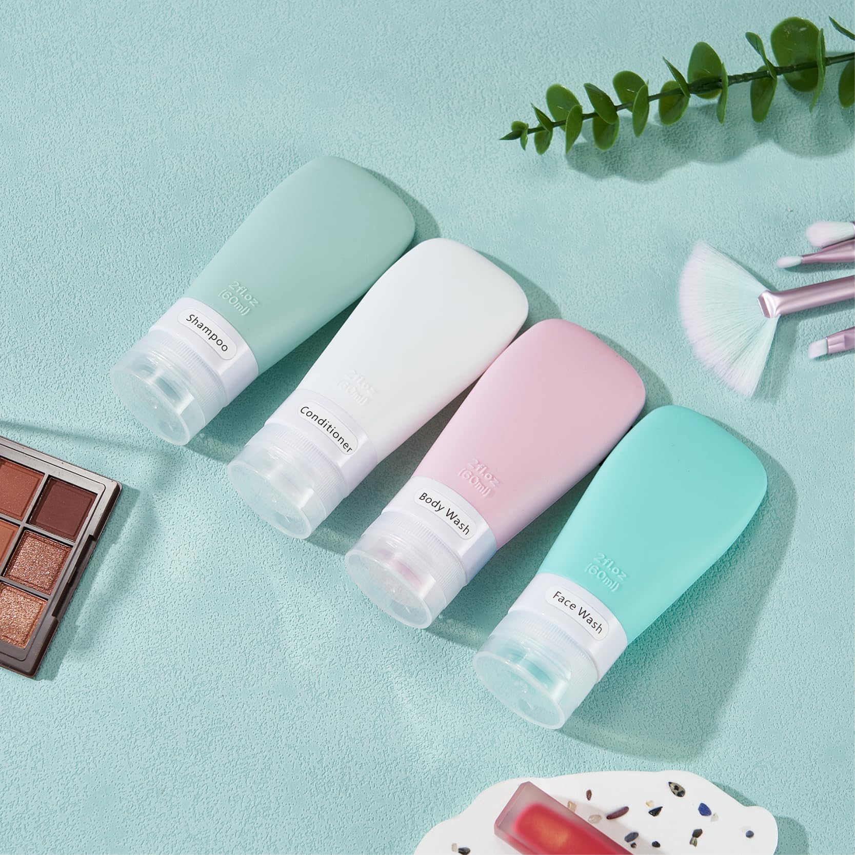 INSFIT travel bottles filled with shampoo and conditioner illustrating compact travel size