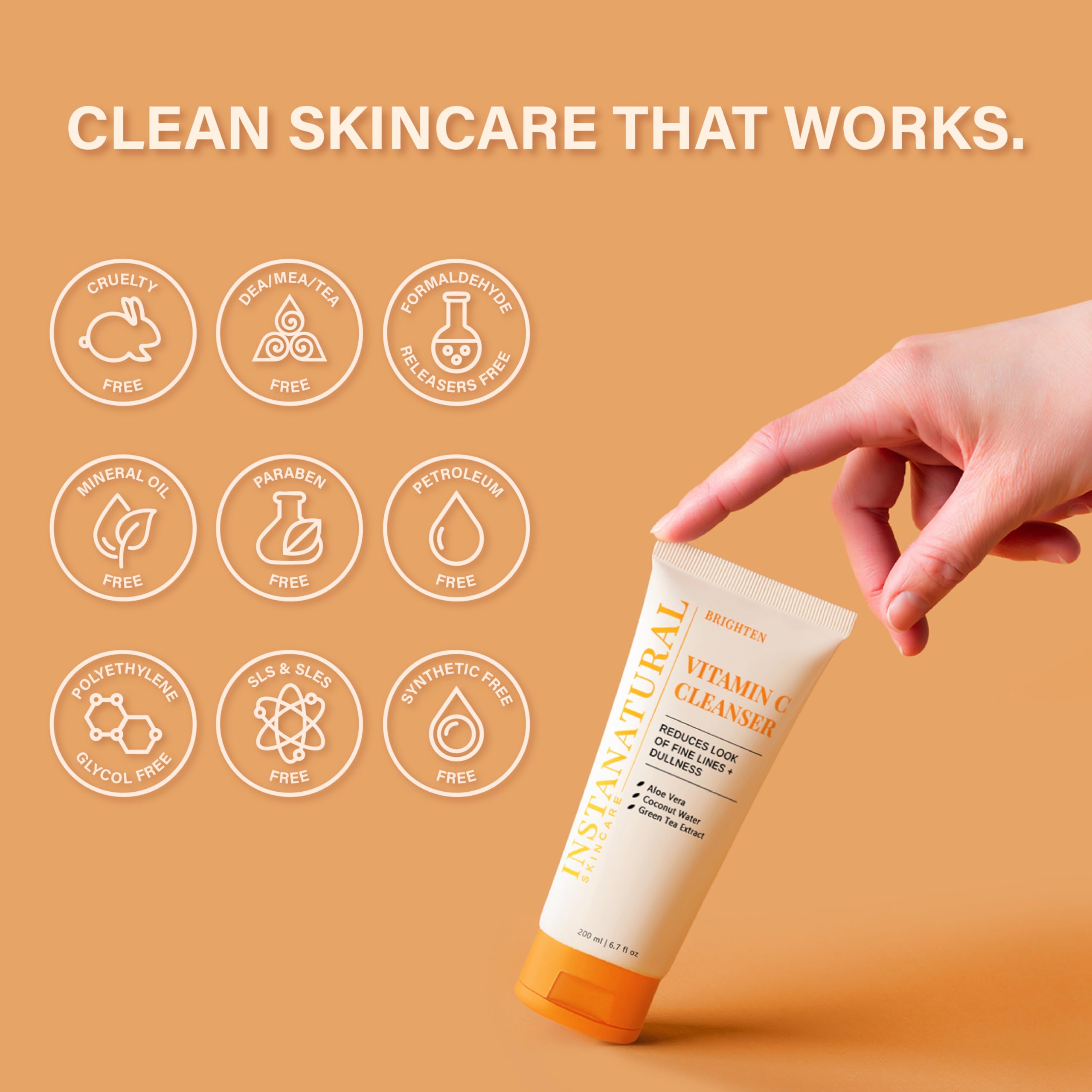 Bathroom scene with refreshed, radiant skin after using InstaNatural Vitamin C Cleanser.