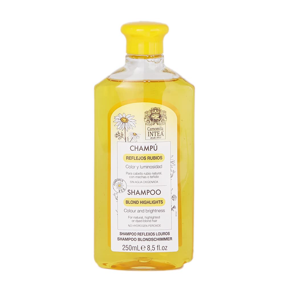 Botella de Intea Chamomile Shampoo realza reflejos rubios con manzanilla.