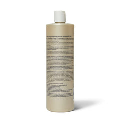 Ion Effective Care Treatment bottle label closeup showing vegan formula for daily nourishment.