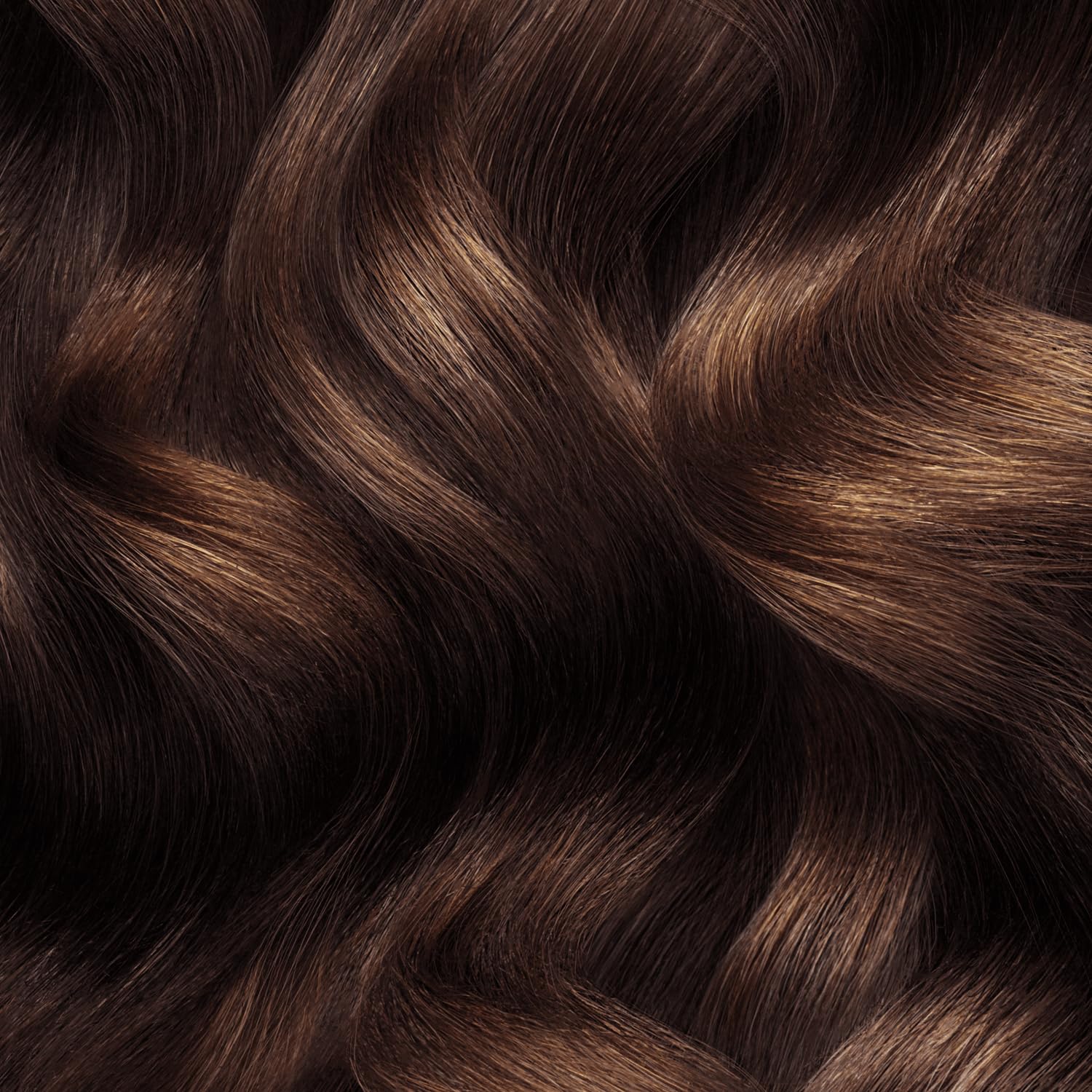 Final brunette result suggests natural tone with long-lasting vibrancy.