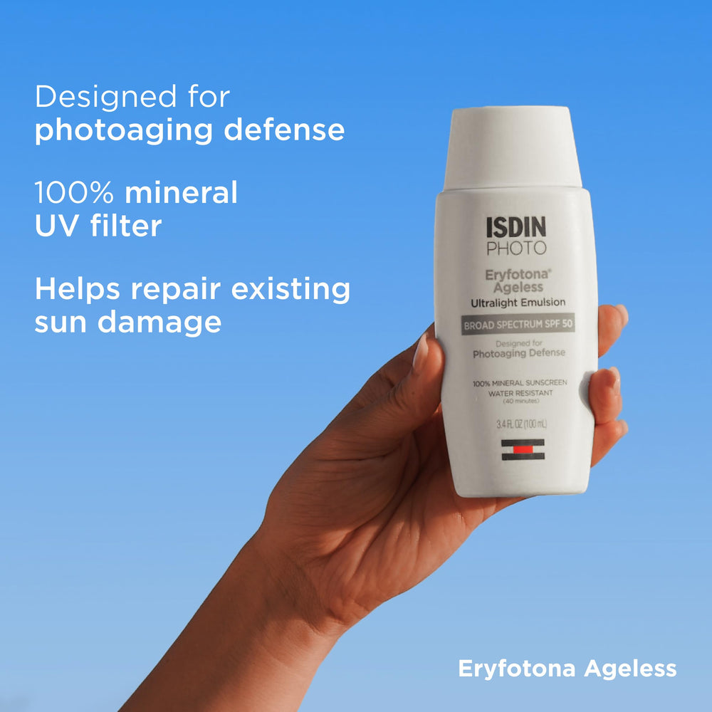 Close-up of ISDIN Eryfotona Ageless SPF 50 being applied on skin.