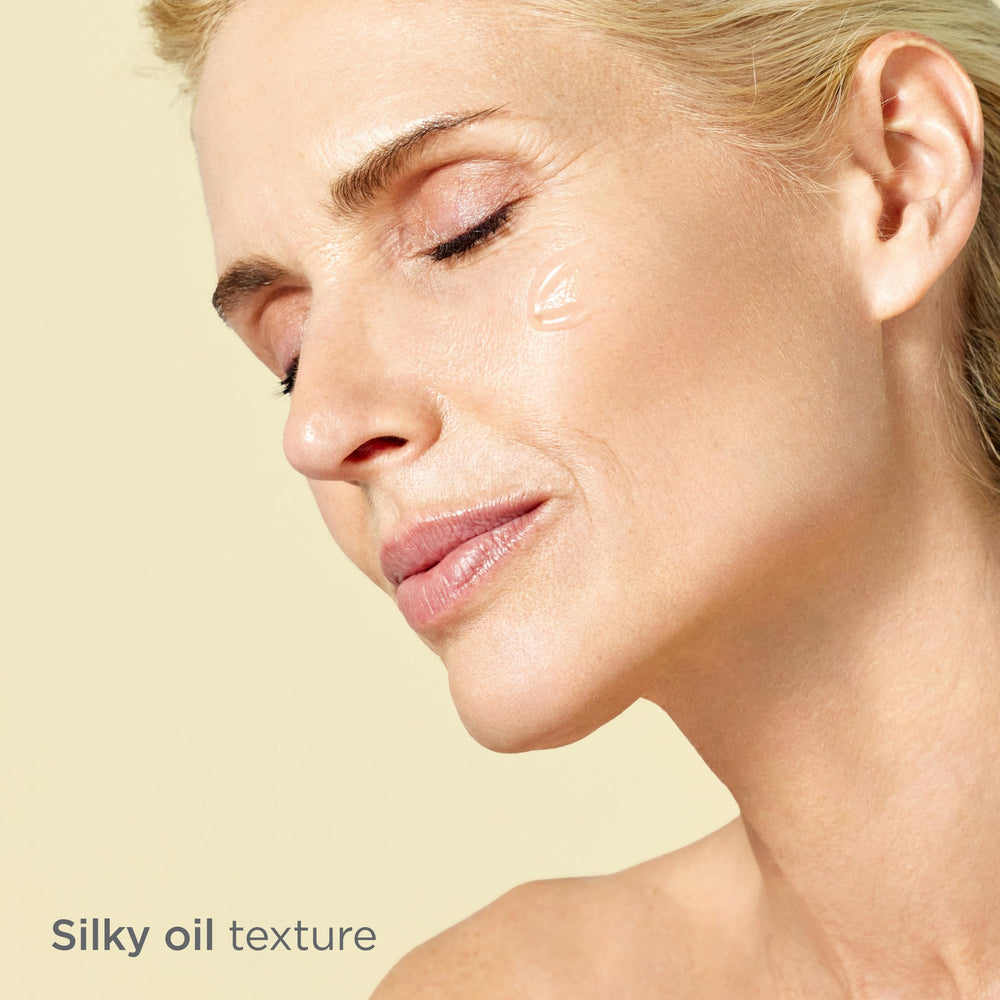ISDIN serum being applied to skin for hydration and glow.