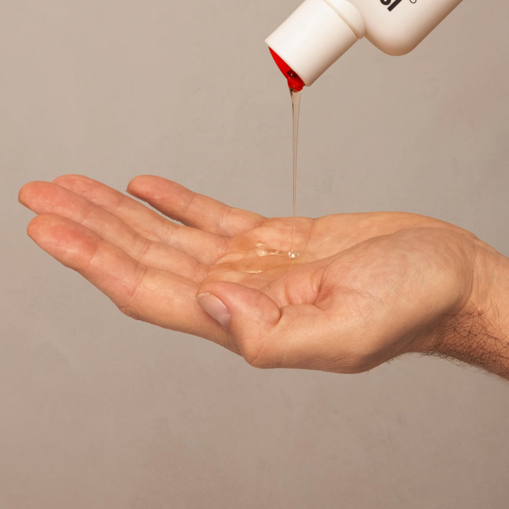 Close-up of ISDIN Lambdapil label highlighting a dermatologist-tested formula