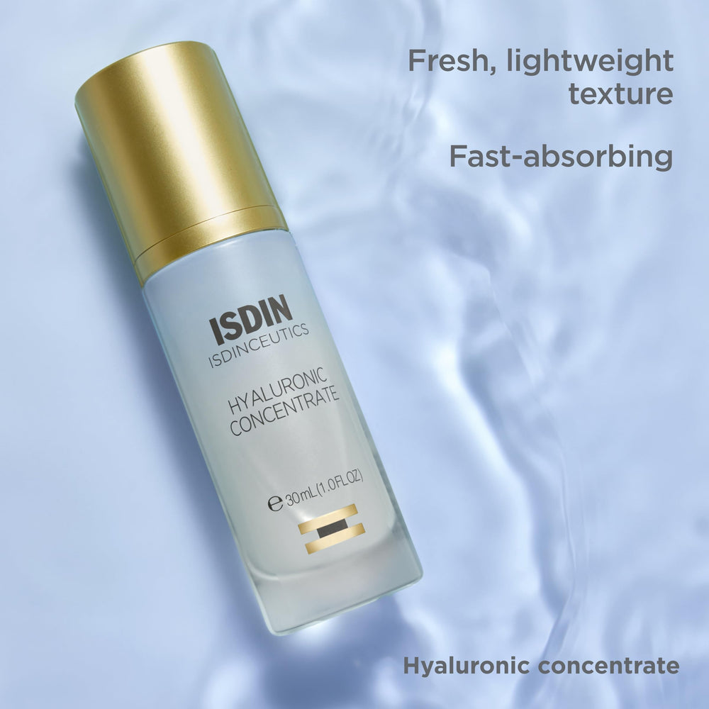 Applying Isdinceutics Hyaluronic Concentrate to cheek for quick hydration
