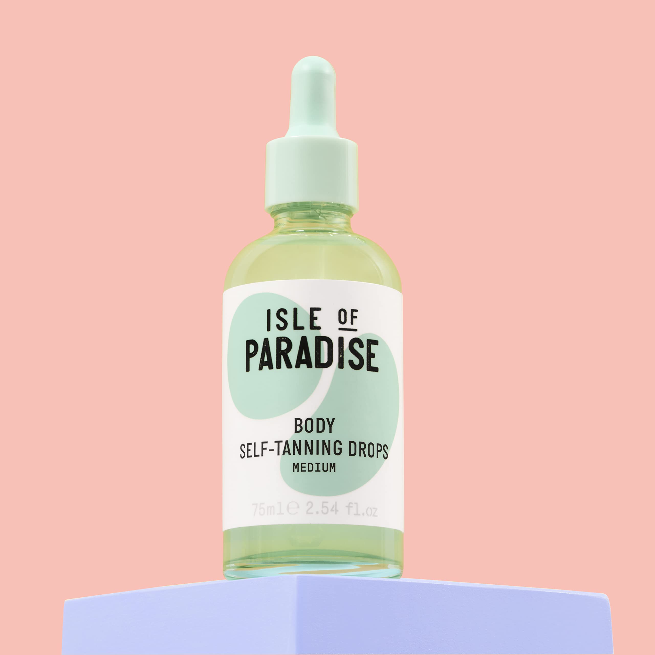 Isle of Paradise self-tanning drops dropper dispense for precise shade mixing.