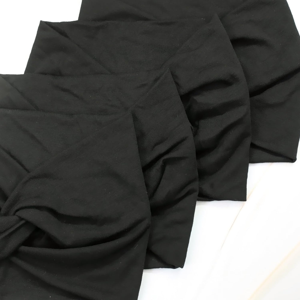 IVARYSS large black headband fits most heads for travel.