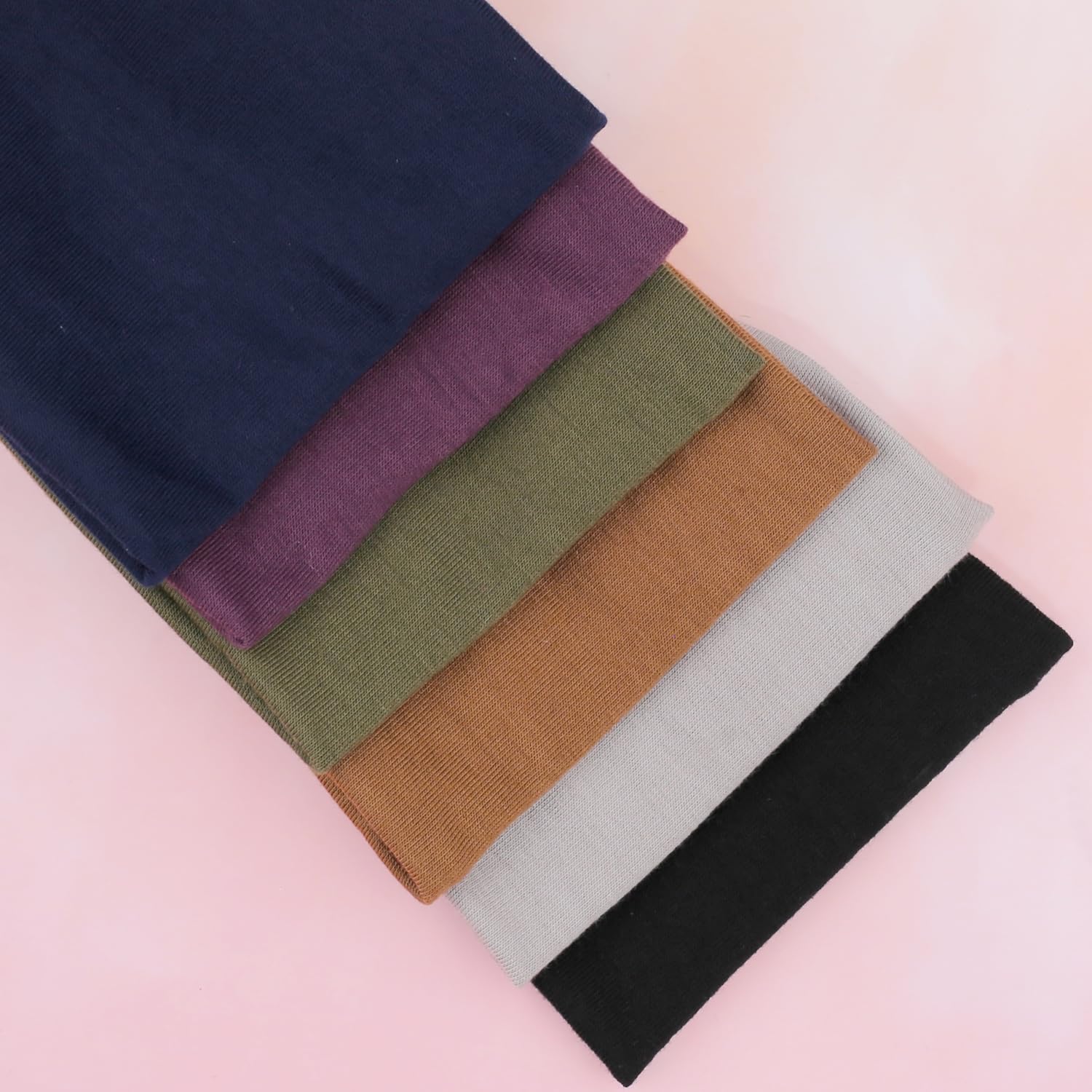 IVARYSS headband khaki blends with outfits and supports sweat management during workouts