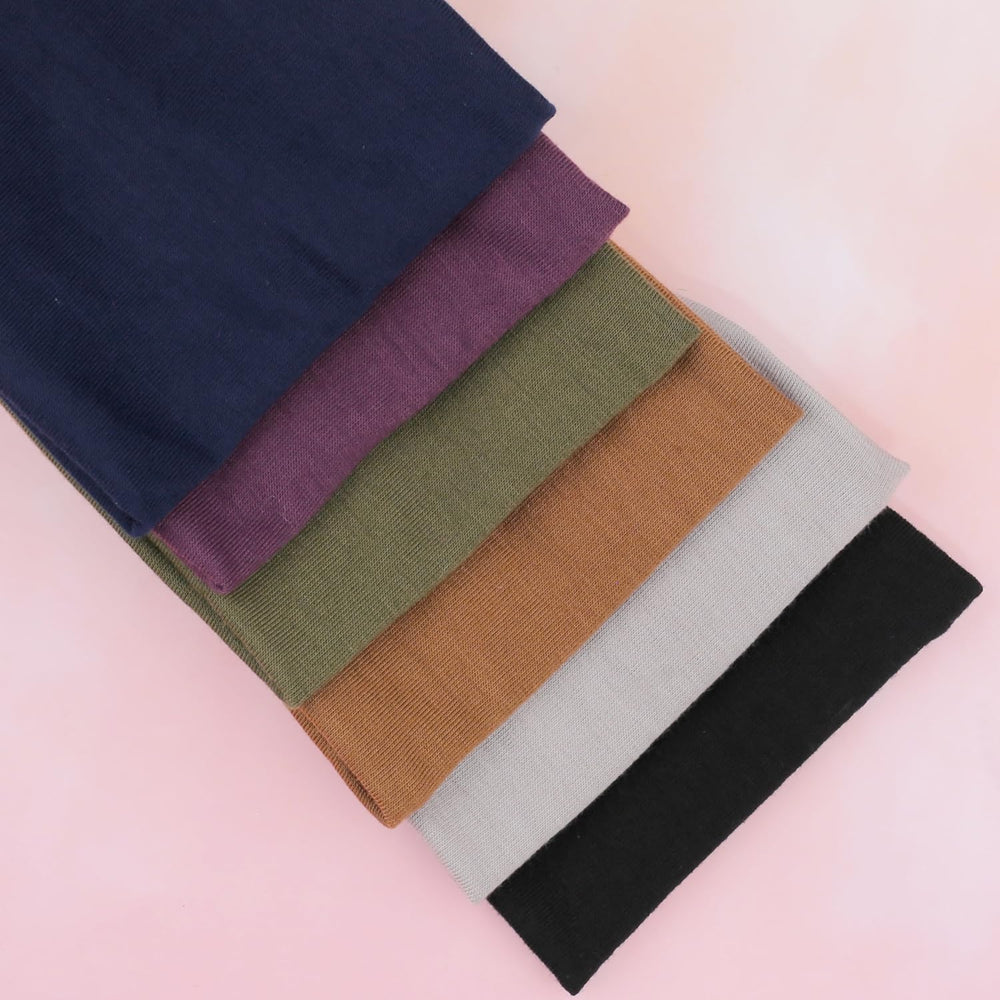 IVARYSS headband khaki blends with outfits and supports sweat management during workouts
