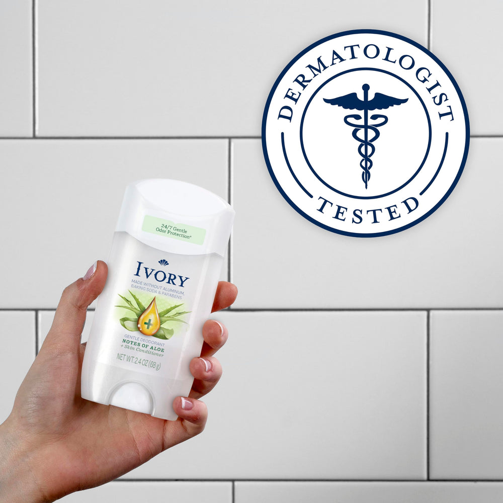 Ivory aloe notes deodorant stick resting on counter.