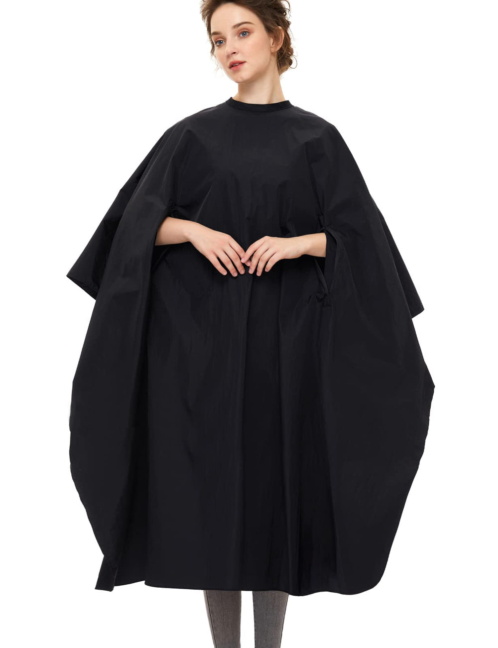 Izzycka professional barber cape with armholes offering hands-free comfort during services
